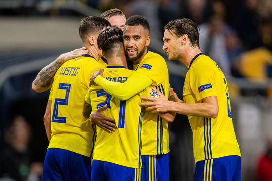 Isaac Kiese Thelin of Sweden celebrates with team mates