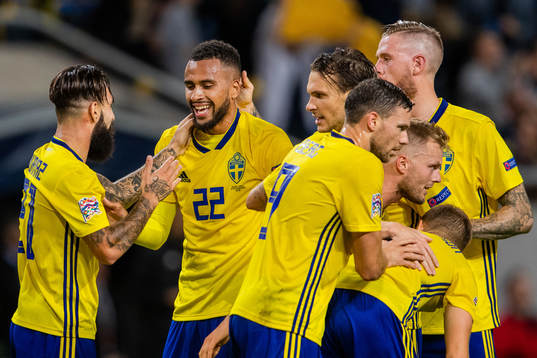 Isaac Kiese Thelin of Sweden celebrates with team mates