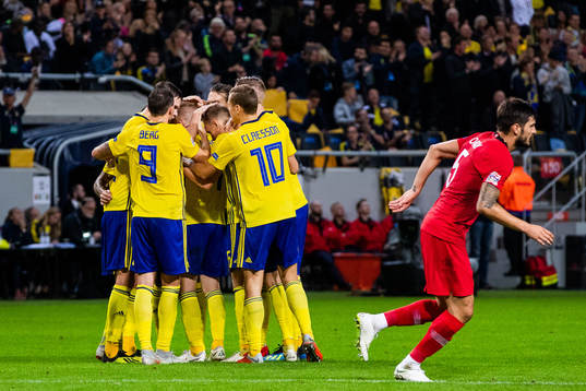 Players of Sweden celebrates