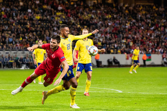Isaac Kiese Thelin of Sweden in action with Okay Yokuslu of