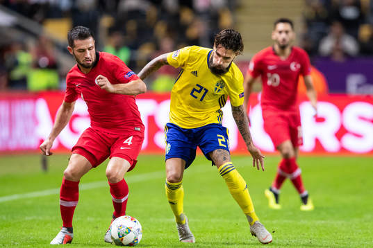 Ömer Bayram of Turkey and Jimmy Durmaz of Sweden
