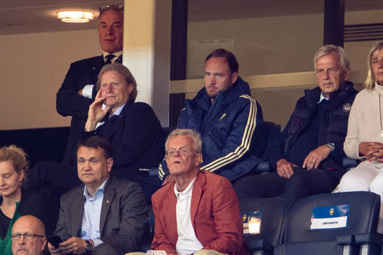 Team Manager Stefan Pettersson and Andreas Granqvist of