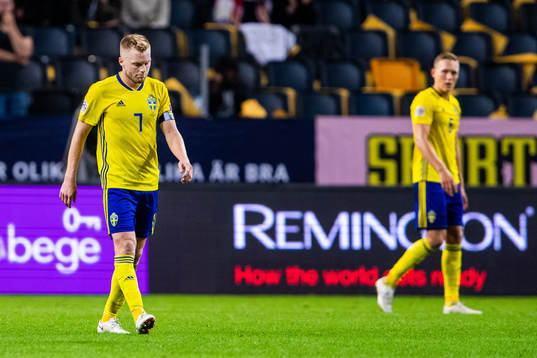 Sebastian Larsson of Sweden looks dejected