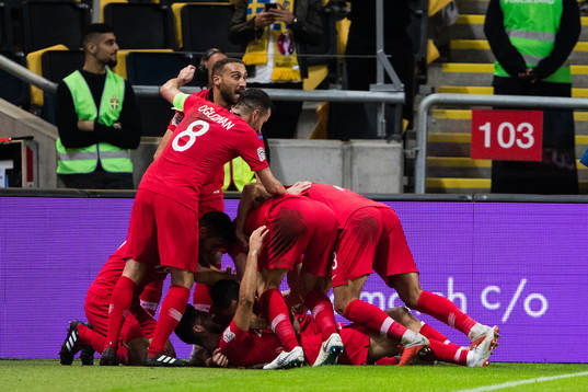 The players of Turkey celebrates 2-3