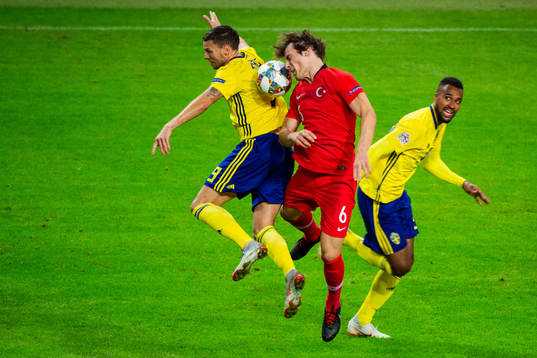 Marcus Berg and Isaac Kiese Thelin of Sweden against Caglar