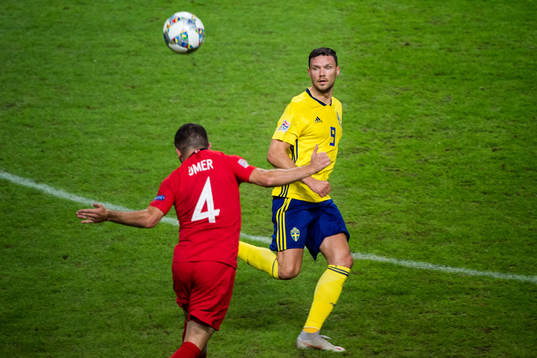 Marcus Berg of Sweden and Ömer Bayram of Turkey