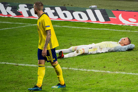 Goalkeeper Robin Olsen of Sweden looks dejected