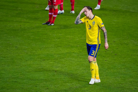 Victor Nilsson Lindelöf of Sweden looks dejected