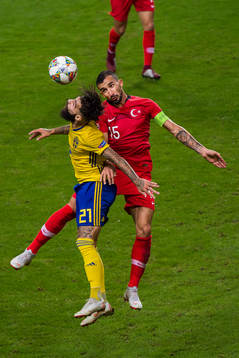 Jimmy Durmaz  of Sweden  and Mehmet Topal of Turkey