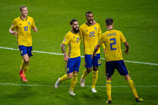 Isaac Kiese Thelin of Sweden celebrates with Jimmy Durmaz,