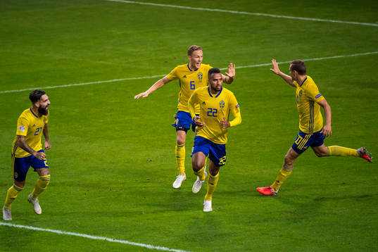 Isaac Kiese Thelin of Sweden celebrates with Jimmy Durmaz,
