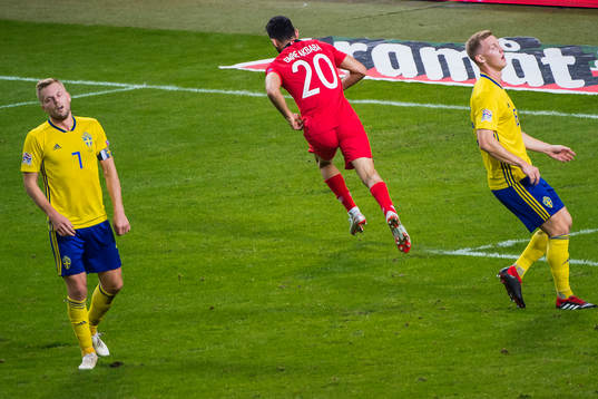 Sebastian Larsson and Emil Krafth of Sweden looks dejected