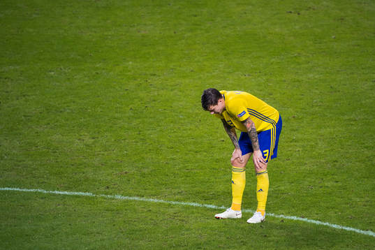 Victor Nilsson Lindelöf of Sweden looks dejected