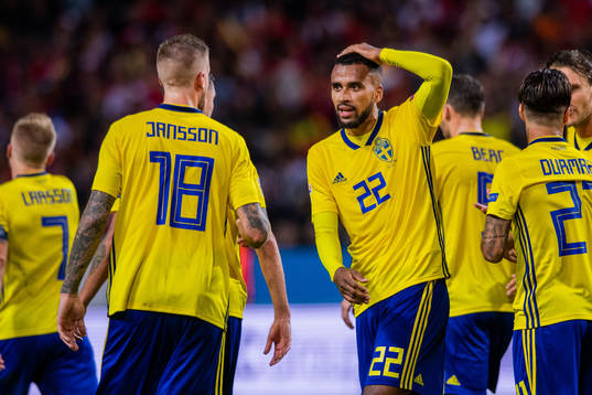 Pontus Jansson and Isaac Kiese Thelin of Sweden celebrates
