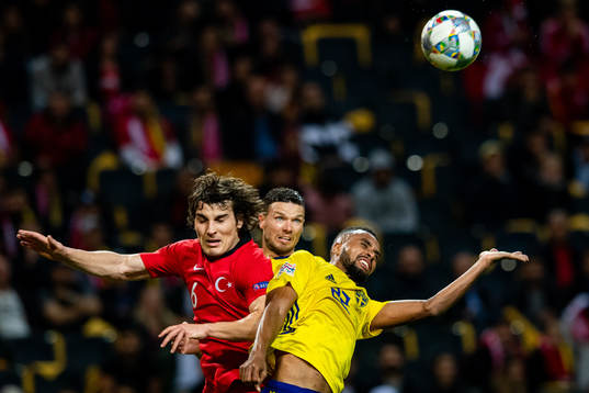 Caglar Söyuncu of Turkey and Isaac Kiese Thelin and Marcus