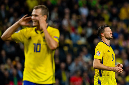 Viktor Claesson of Sweden and Marcus Berg of Sweden