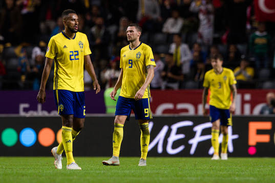 Isaac Kiese Thelin and Marcus Berg of Sweden looks dejected