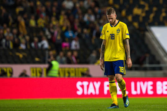 Pontus Jansson of Sweden looks dejected
