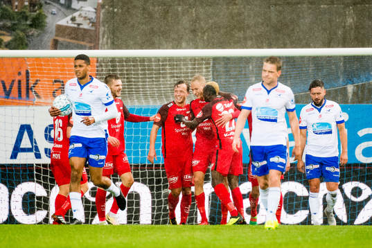 Kristoffer Barmen of Brann celebrates with his teammates