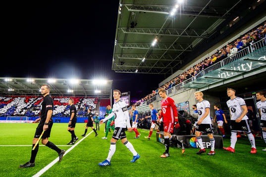 Mike Jensen of Rosenborg enters the pitch