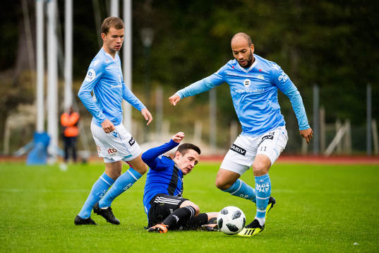 Vegard Østraat Erlien of Sandnes Ulf, Peter Aase of Florø