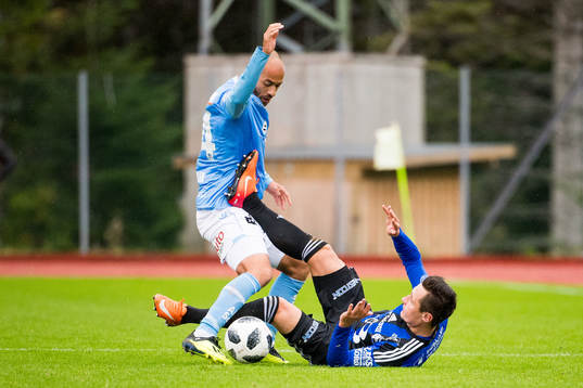 Kristian Brix of Sandnes Ulf and Peter Aase of Florø