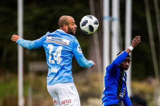 Kristian Brix of Sandnes Ulf and Alioune Ndour of Florø
