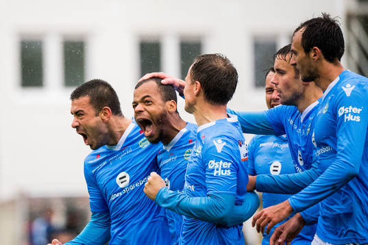 Erixon Danso of Sandnes Ulf celebrates with teammates