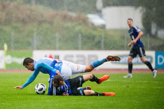 Sanel Kapidzic of Sandnes Ulf and André Reksten of Florø