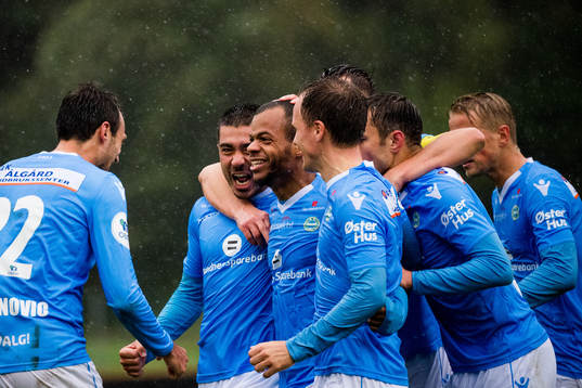 Erixon Danso of Sandnes Ulf celebrates with teammates