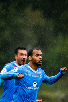 Erixon Danso of Sandnes Ulf celebrates with teammates