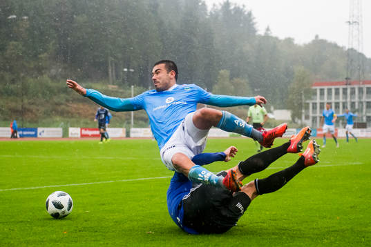 Sanel Kapidzic of Sandnes Ulf and Peter Aase of Florø