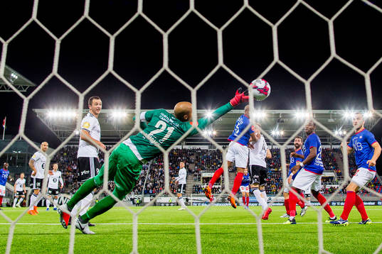 Jonathan Levi of Rosenborg scores 1-1 behind goalkeeper