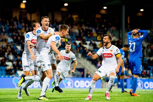 Axel Andresson of Viking celebrates with teammates Markus