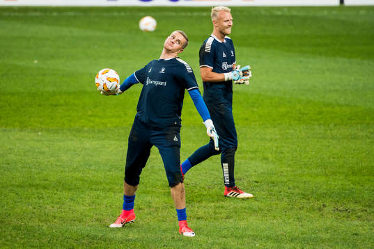 Goalkeeper Aleksandr Vasyutin and goalkeeper Aslak Falch of