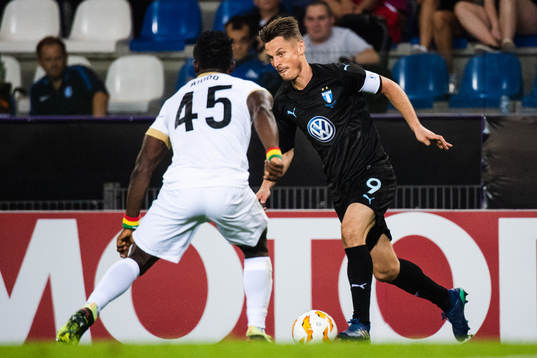 Joseph Aidoo of Genk and Markus Rosenberg of Malmö FF