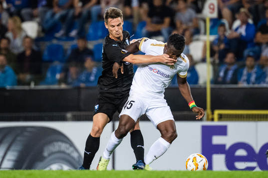 Markus Rosenberg of Malmö FF and Joseph Aidoo of Genk