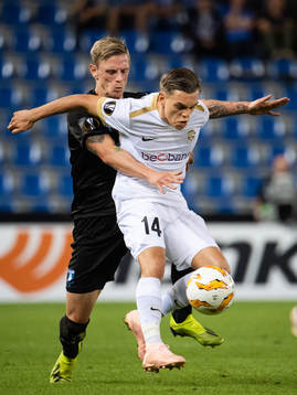 Sören Rieks of Malmö FF and Leandro Trossard of Genk