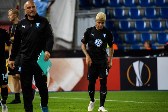 Goalkeeper coach Jonnie Fedel and Romain Gall looks dejected