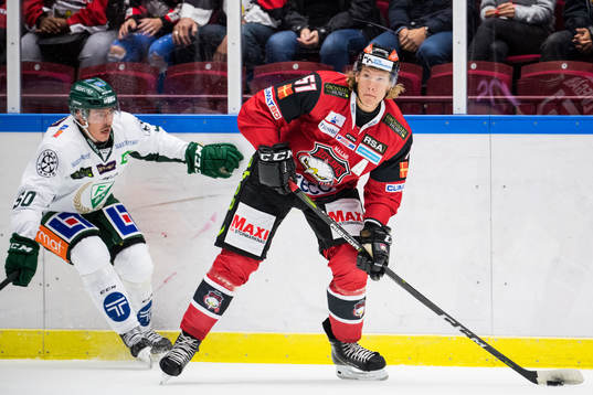 Färjestads Sebastian Erixon och Malmö Redhawks Emil