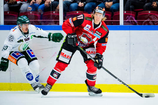 Färjestads Sebastian Erixon och Malmö Redhawks Emil