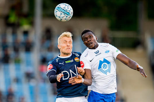 Eirik Ulland Andersen of Strømsgodset and Babacar Sarr of