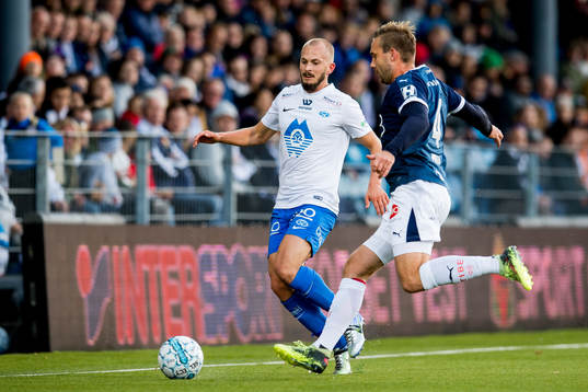 Eirik Hestad of Molde and Kim André Madsen of Strømsgodset