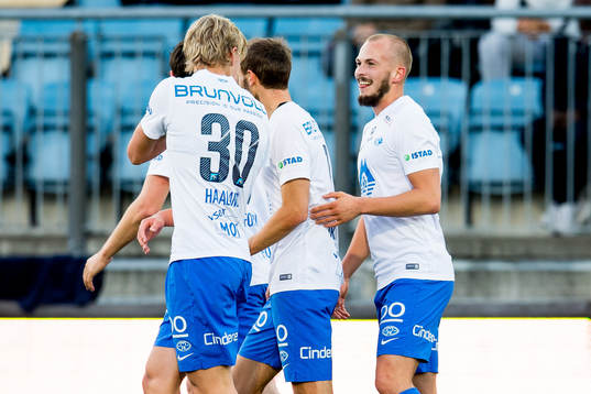 Eirik Hestad of Molde celebrates with teammate Erling Braut