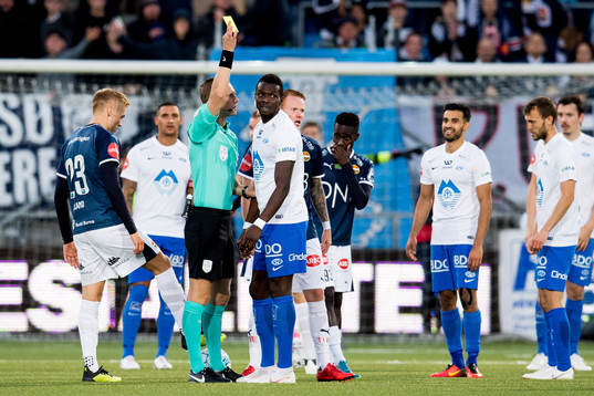 Espen Andreas Eskås, referee, gives Babacar Sarr of Molde