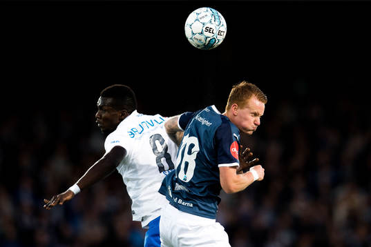 Babacar Sarr of Molde and Martin Rønning Ovenstad of
