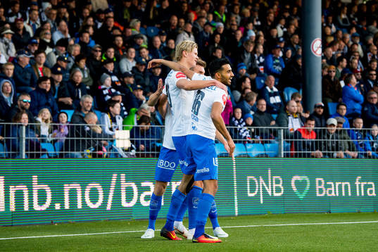 Erling Braut Håland of Molde celebrates with teammate