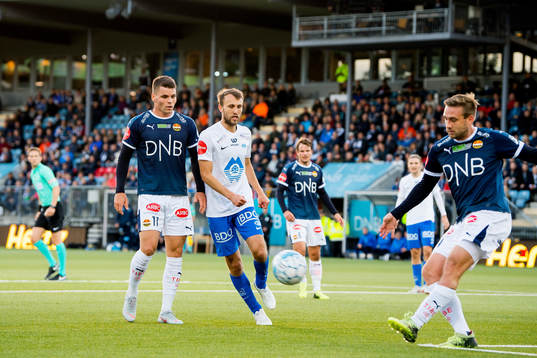 Kristoffer Tokstad of Strømsgodset and Magnus Eikrem of