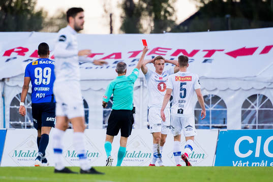 Ivar Furu of Ranheim is shown a red card by referee Tommy