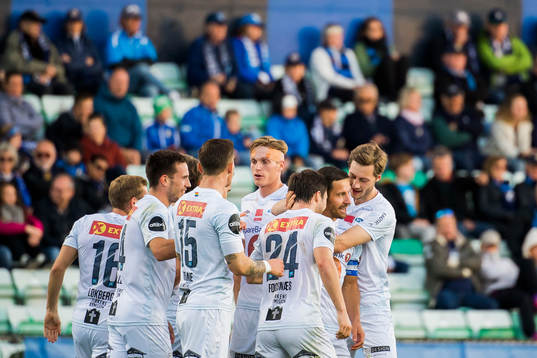 Mads Reginiussen of Ranheim celebrates with his teammates